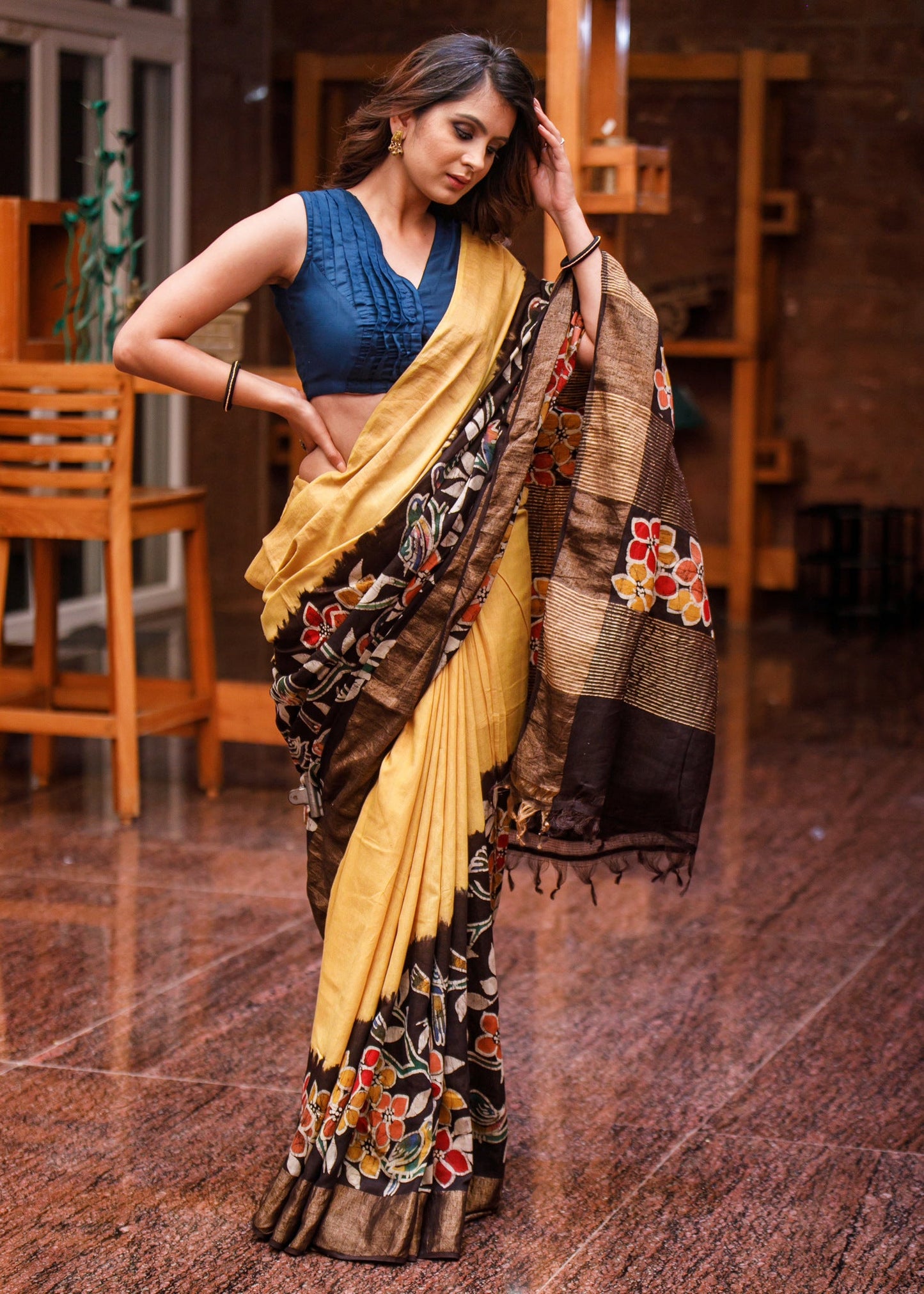 Exclusive yellow hand batik on matka silk mix saree