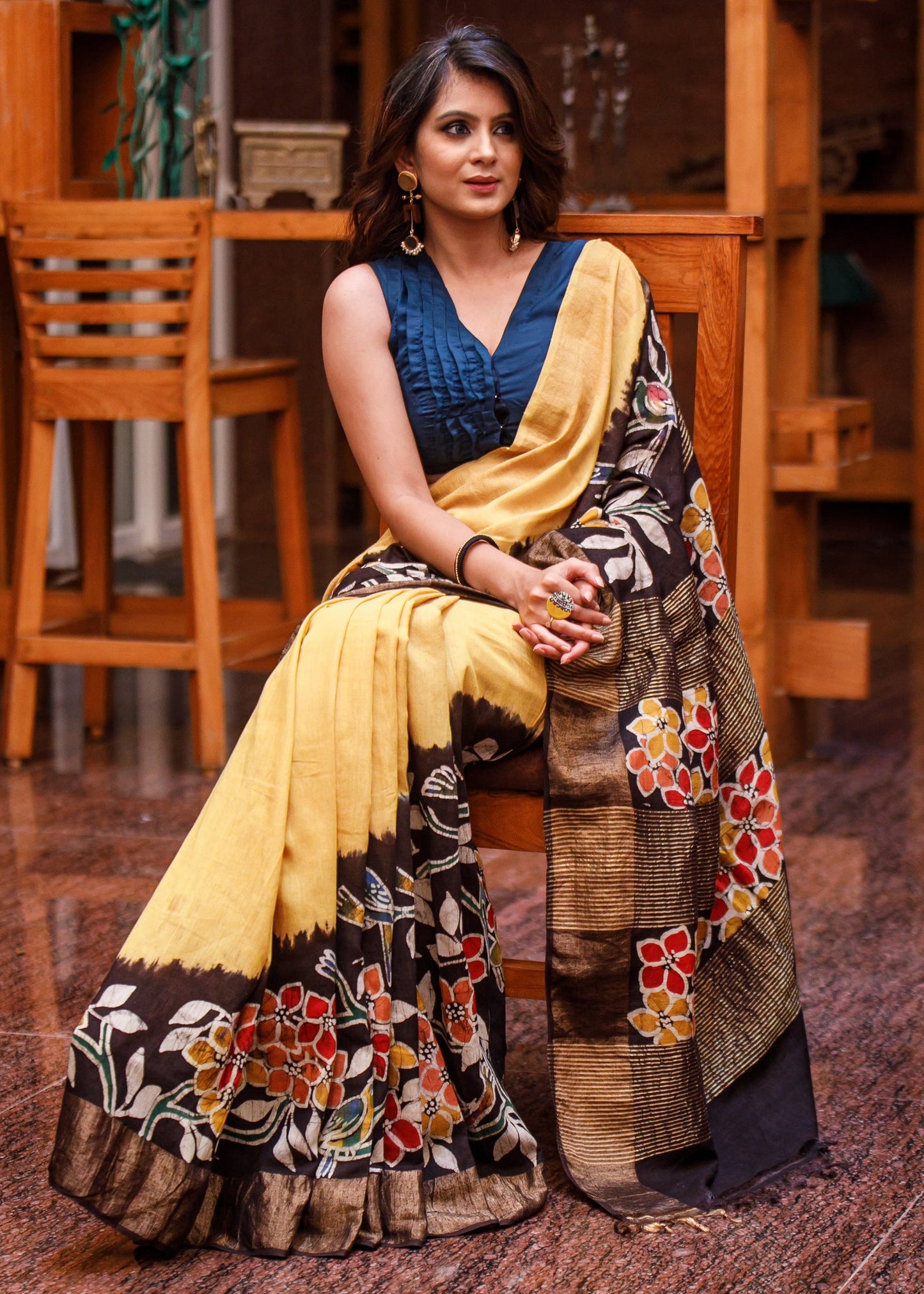 Exclusive yellow hand batik on matka silk mix saree