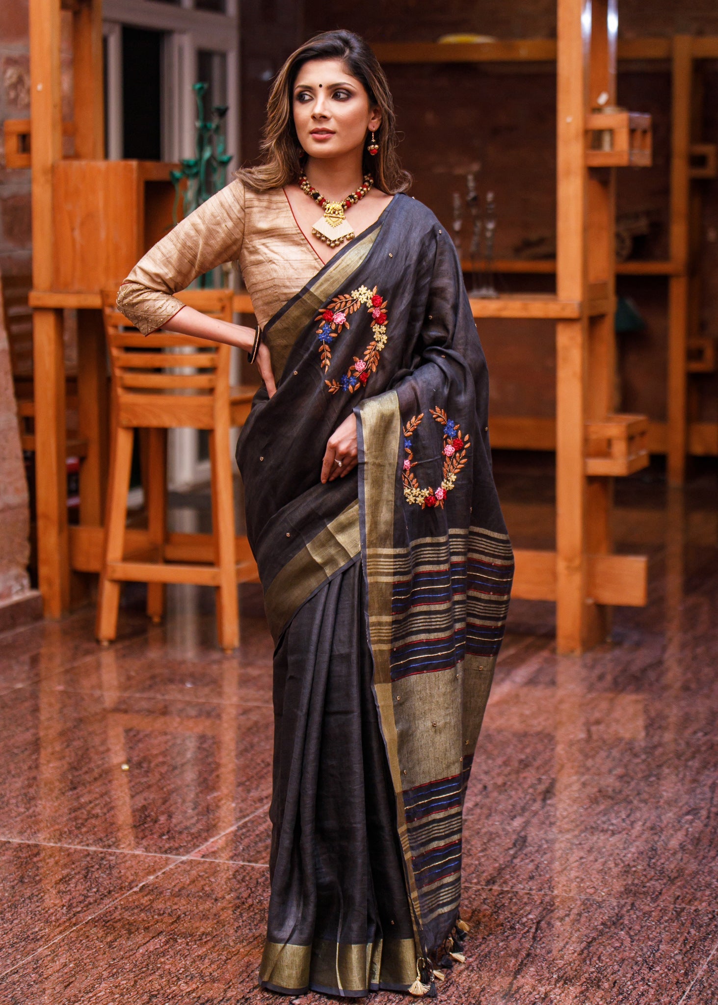 Exclusive black pure linen saree with hand embroidery