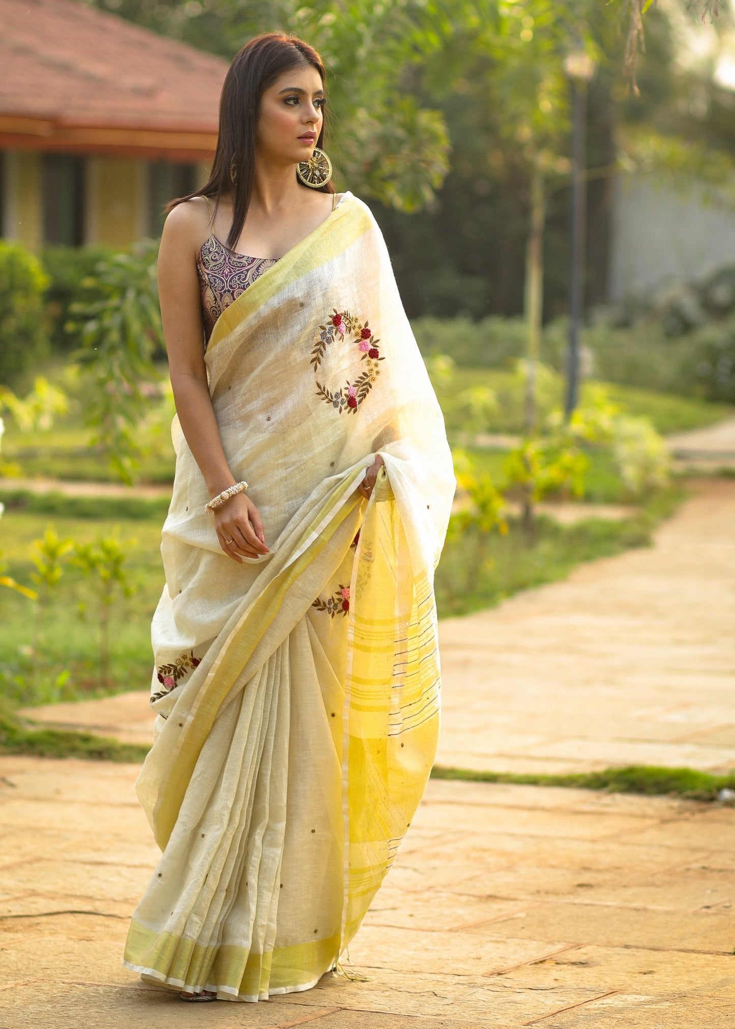 Exclusive beige  pure linen saree with intricate embroidery & mirror work embellishments