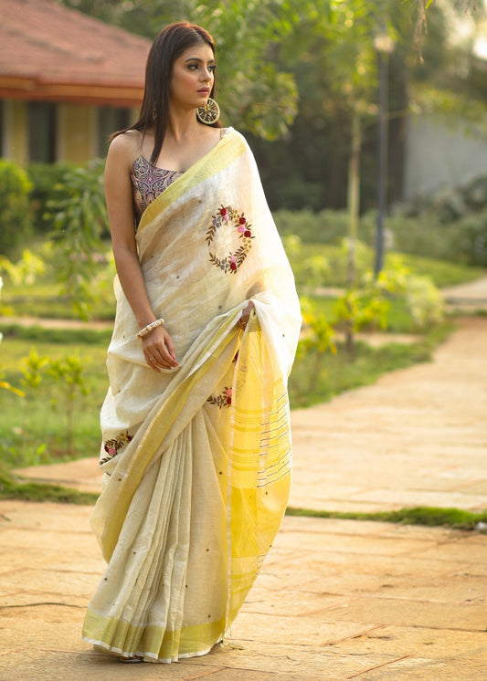 Exclusive beige  pure linen saree with intricate embroidery & mirror work embellishments