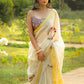 Exclusive beige  pure linen saree with intricate embroidery & mirror work embellishments