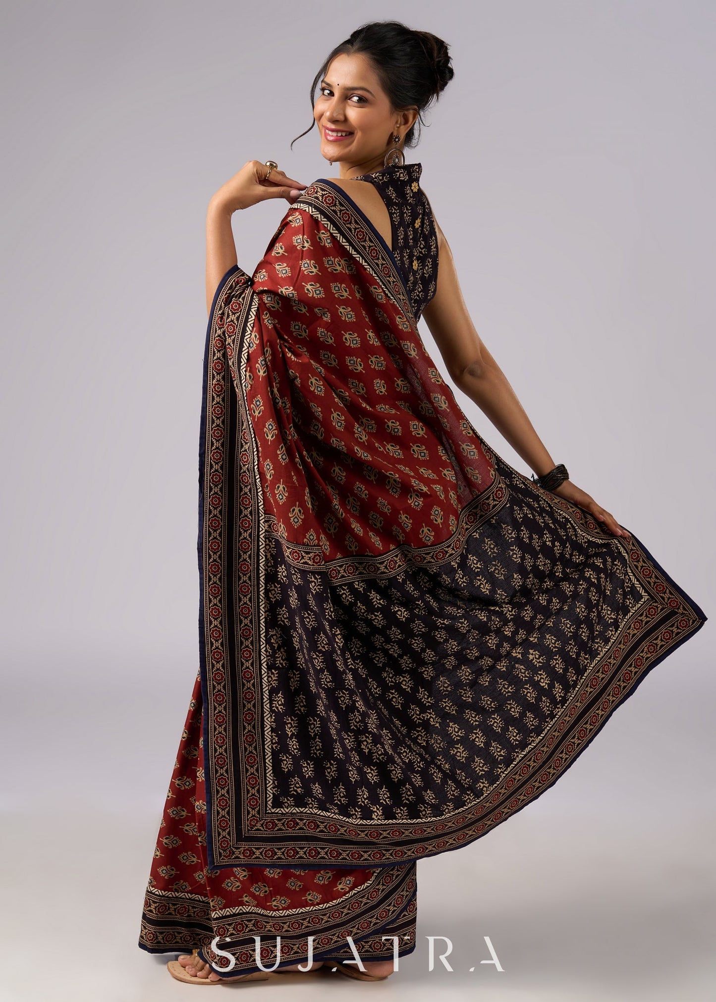 Exclusive brown printed combination saree with Ajrakh border