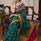 Elegant green Ikaat cotton saree with exclusive hand painted Kalamkari border