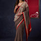 Exclusive Black Ajrakh Cotton Saree with Hand-Painted Madhubani Border Highlighted with Maroon Detailing