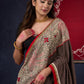 Exclusive Black Ajrakh Cotton Saree with Hand-Painted Madhubani Border Highlighted with Maroon Detailing