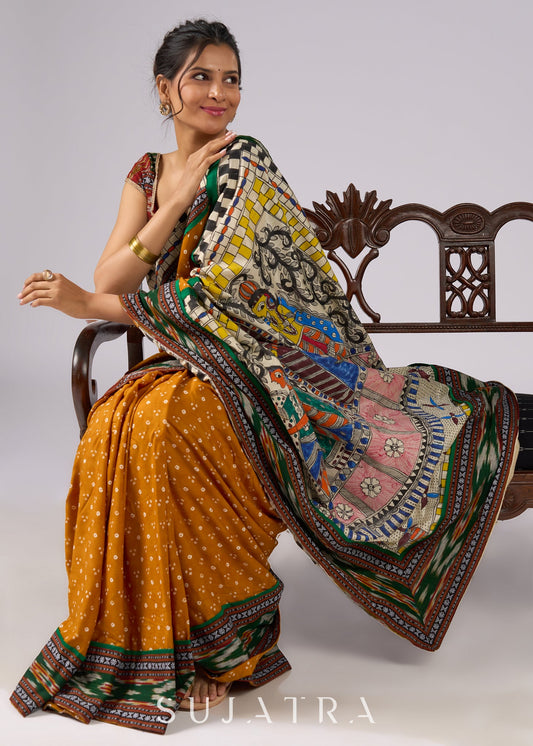 Vibrant yellow Bandhni print rayon saree with hand painted Madhubani art