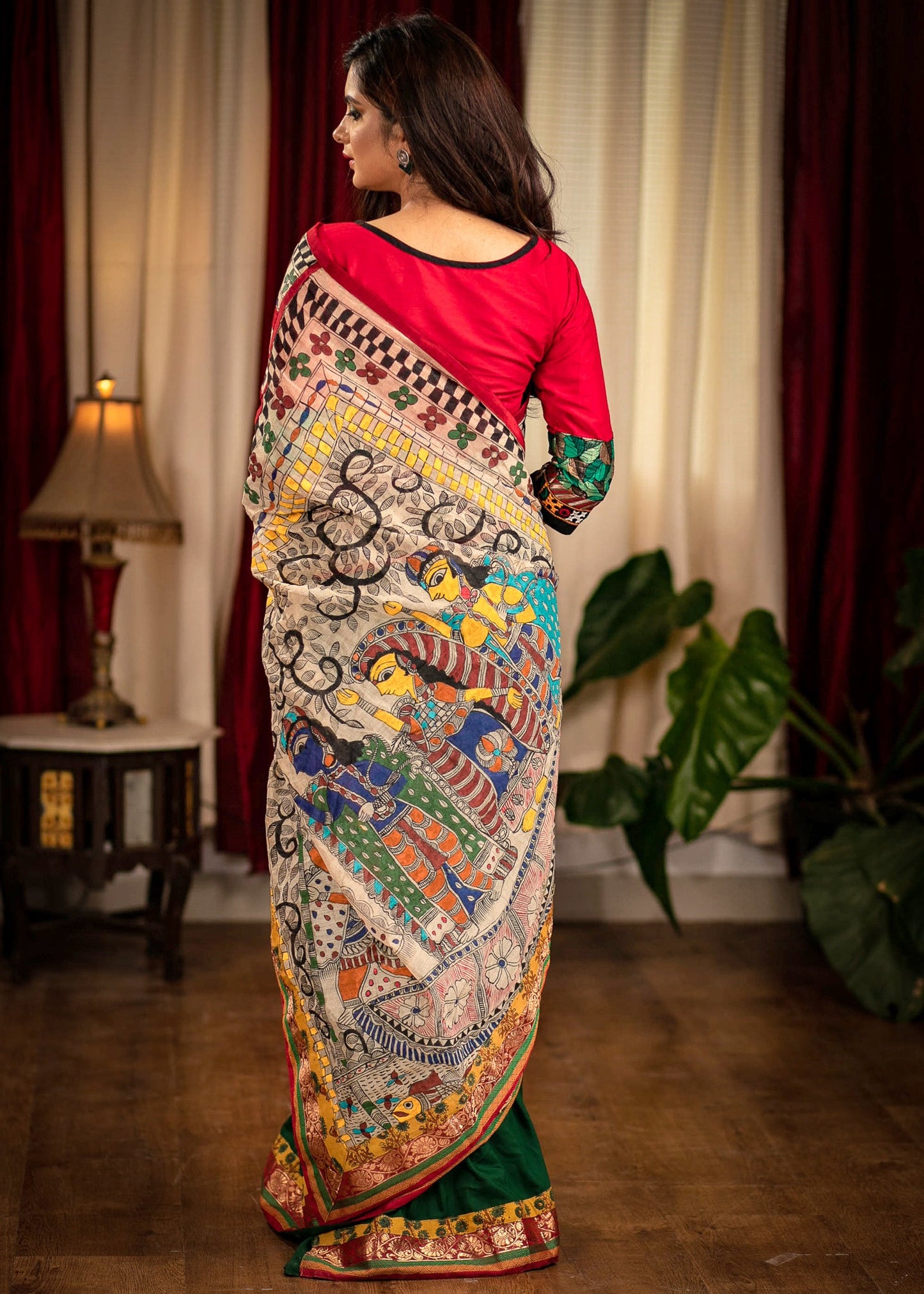 Forest green muslin saree with hand painted madhubani pallu & benarasi border