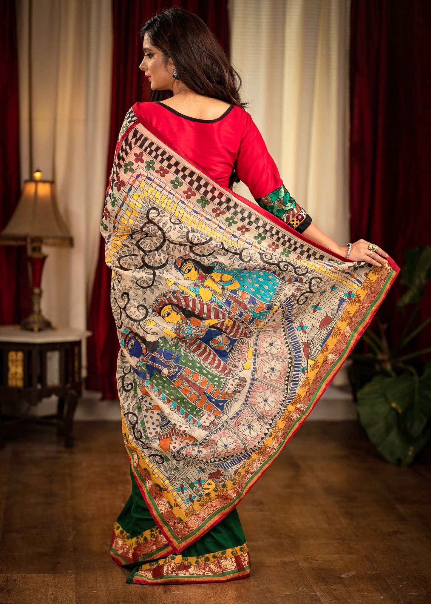 Forest green muslin saree with hand painted madhubani pallu & benarasi border