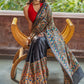 Exclusive black pure raw silk all over hand painted madhubani saree