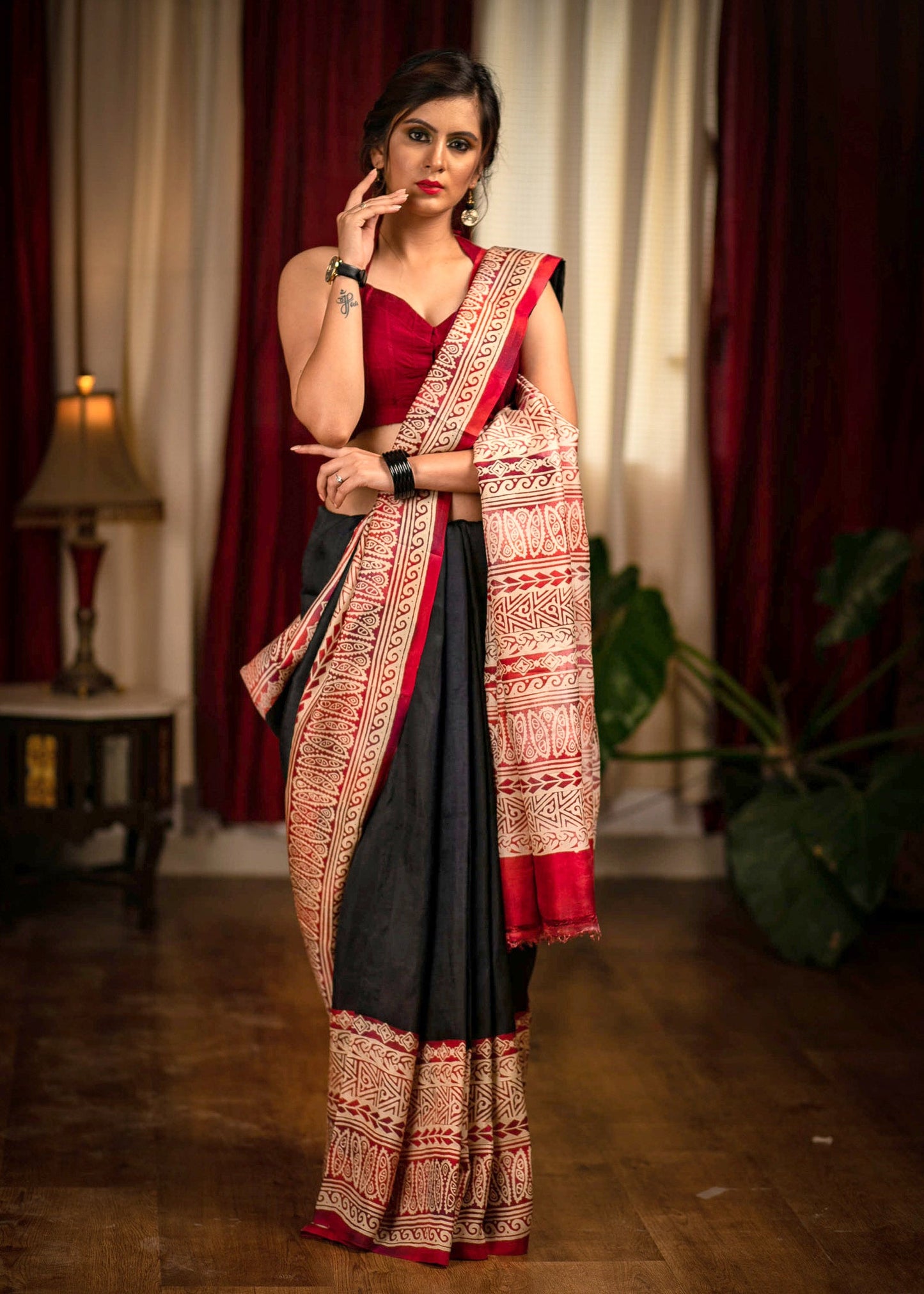 Black pure silk Bishnupuri saree with exclusive designer motifs