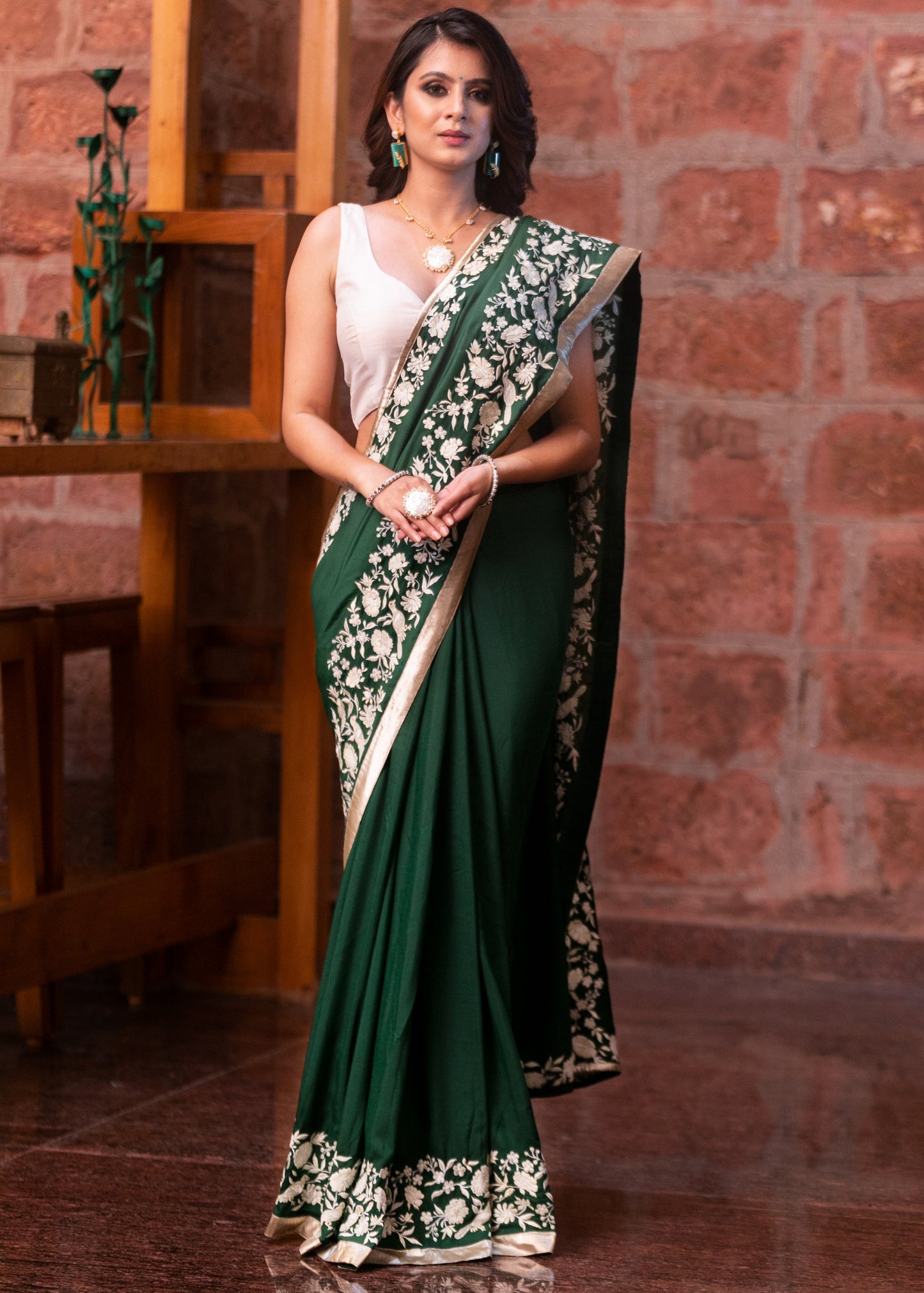 Forest green satin saree with parsi embroidered border