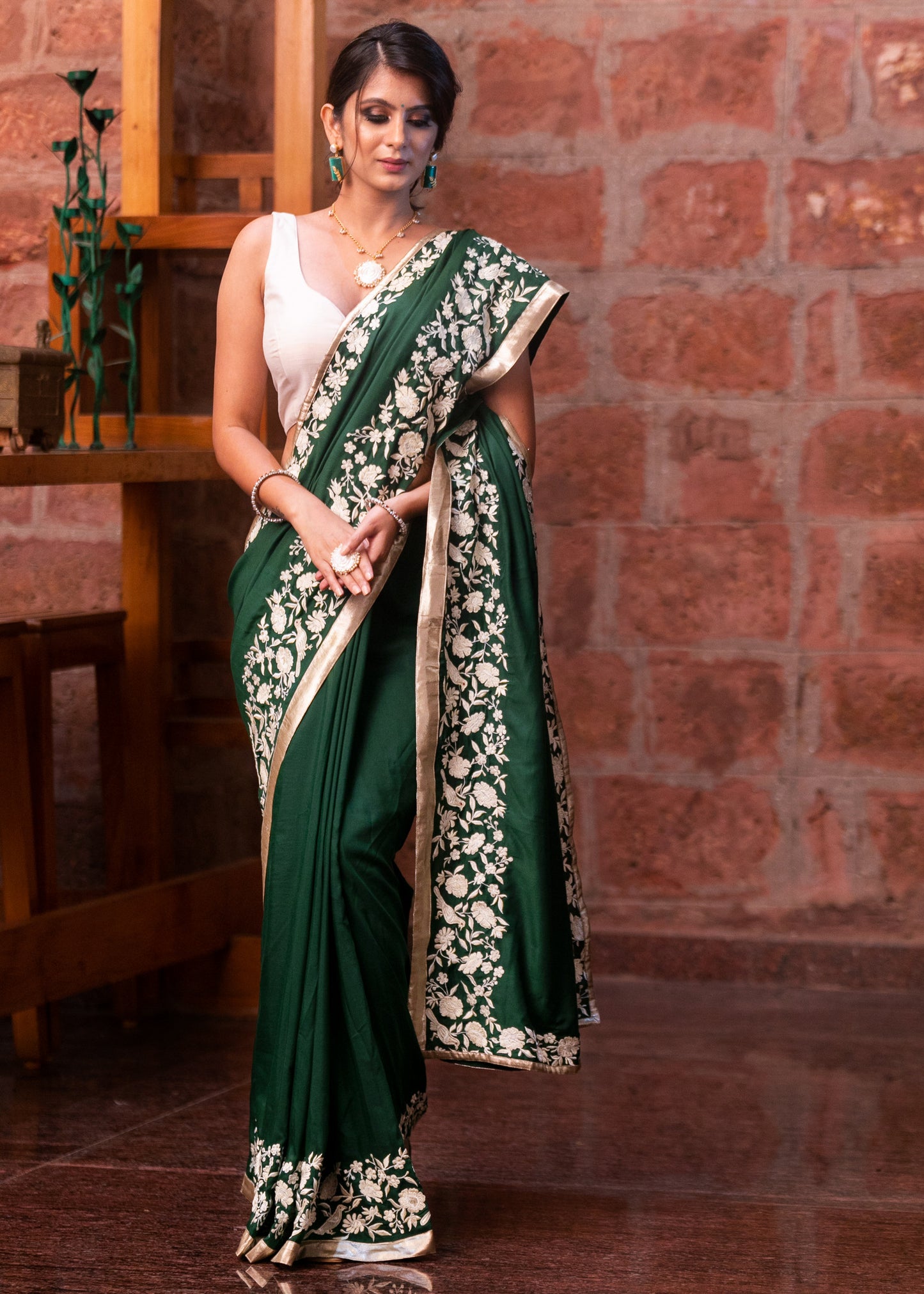 Forest green satin saree with parsi embroidered border