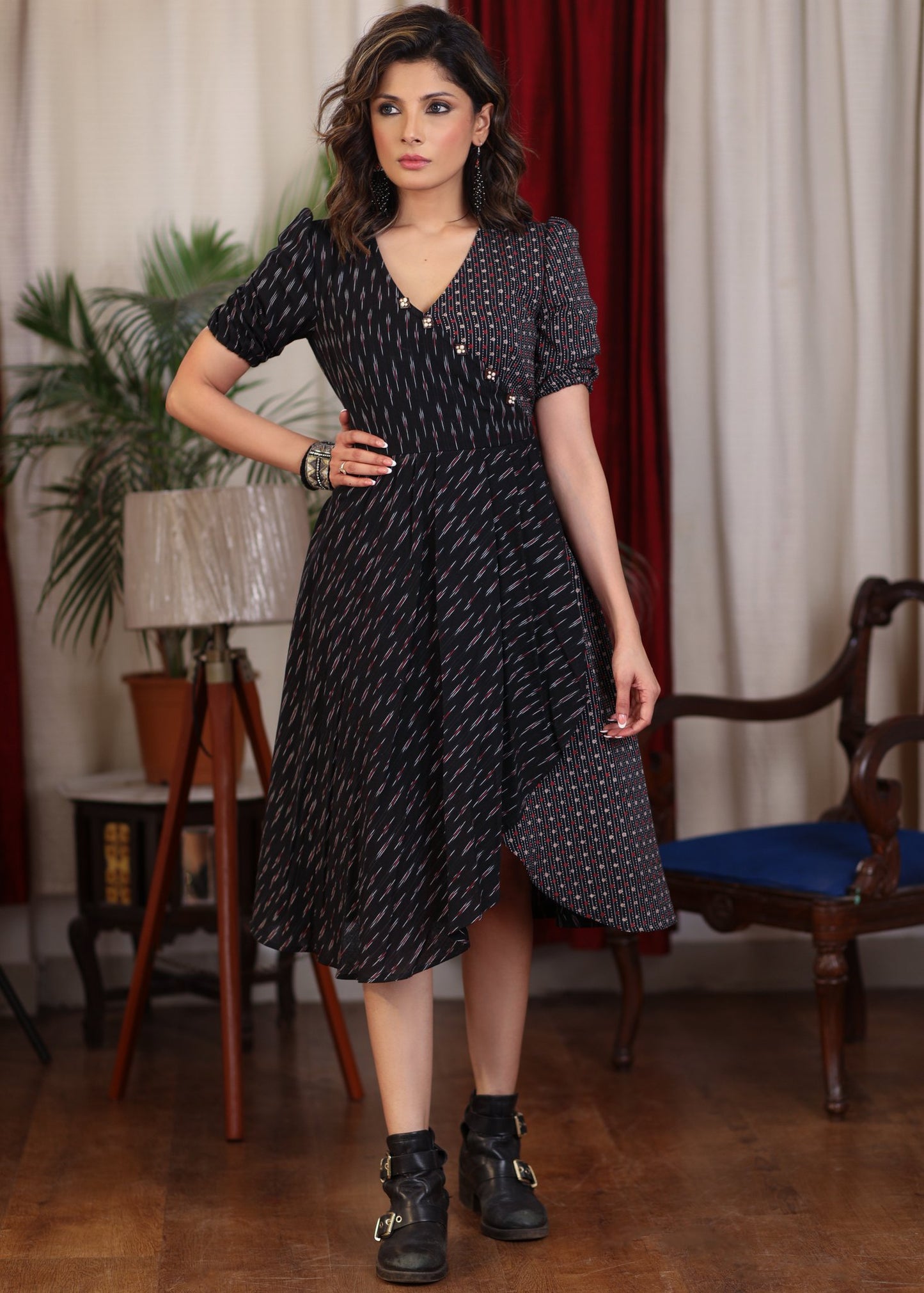 Elegant black ikat and katha work overlap dress highlighted with beautiful wooden buttons