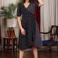 Elegant black ikat and katha work overlap dress highlighted with beautiful wooden buttons