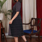 Elegant black ikat and katha work overlap dress highlighted with beautiful wooden buttons