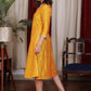 Beautiful mango cotton silk dress with pockets highlighted with zari lace and coin embellishments