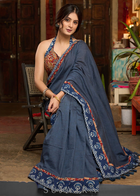 Stylish midnight blue cotton saree highlighted with indigo and kalamkari borders