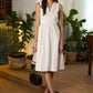 Elegant Off-White Cotton A line one piece dress highlighted with Pleated Yoke