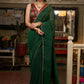 Trendy bottle green cotton saree highlighted with golden lace