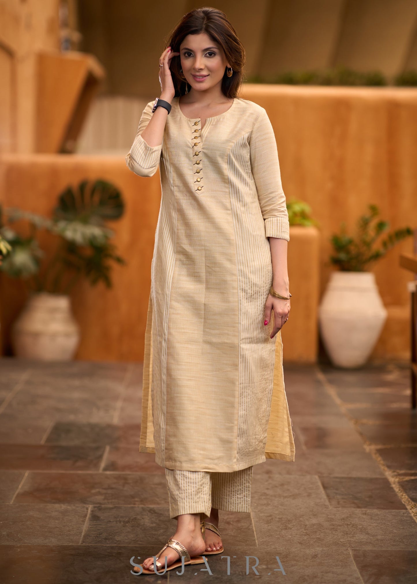 Elegant beige & striped princess cut kurta with mettalic buttons Pant optional