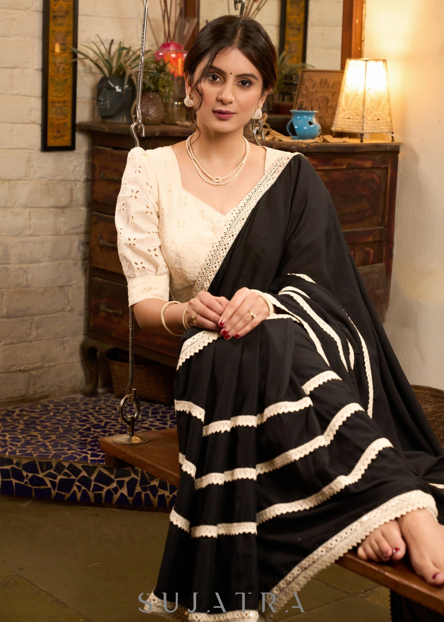 Beautiful Black modal cotton saree highlighted with beautiful crochet laces