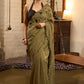 Elegant dark olive green cotton saree highlighted with floral applique and overall scallops