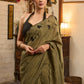 Elegant dark olive green cotton saree highlighted with floral applique and overall scallops