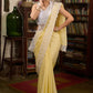 Gracious pastel yellow modal cotton saree highlighted with beautiful laces