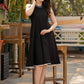 Elegant black cotton halter neck dress with embroidered neckline