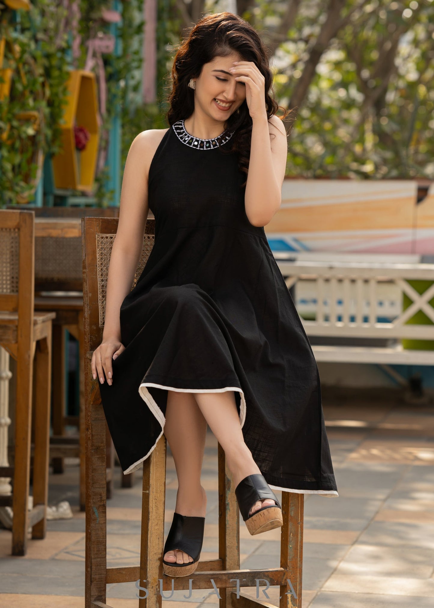 Elegant black cotton halter neck dress with embroidered neckline