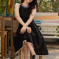 Elegant black cotton halter neck dress with embroidered neckline