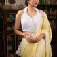 Gracious pastel yellow modal cotton saree highlighted with beautiful laces