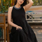 Elegant black cotton halter neck dress with embroidered neckline