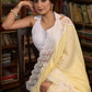 Gracious pastel yellow modal cotton saree highlighted with beautiful laces