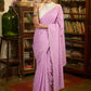 Gracious lilac mul cotton saree with embroidered disty florals and overall scallops