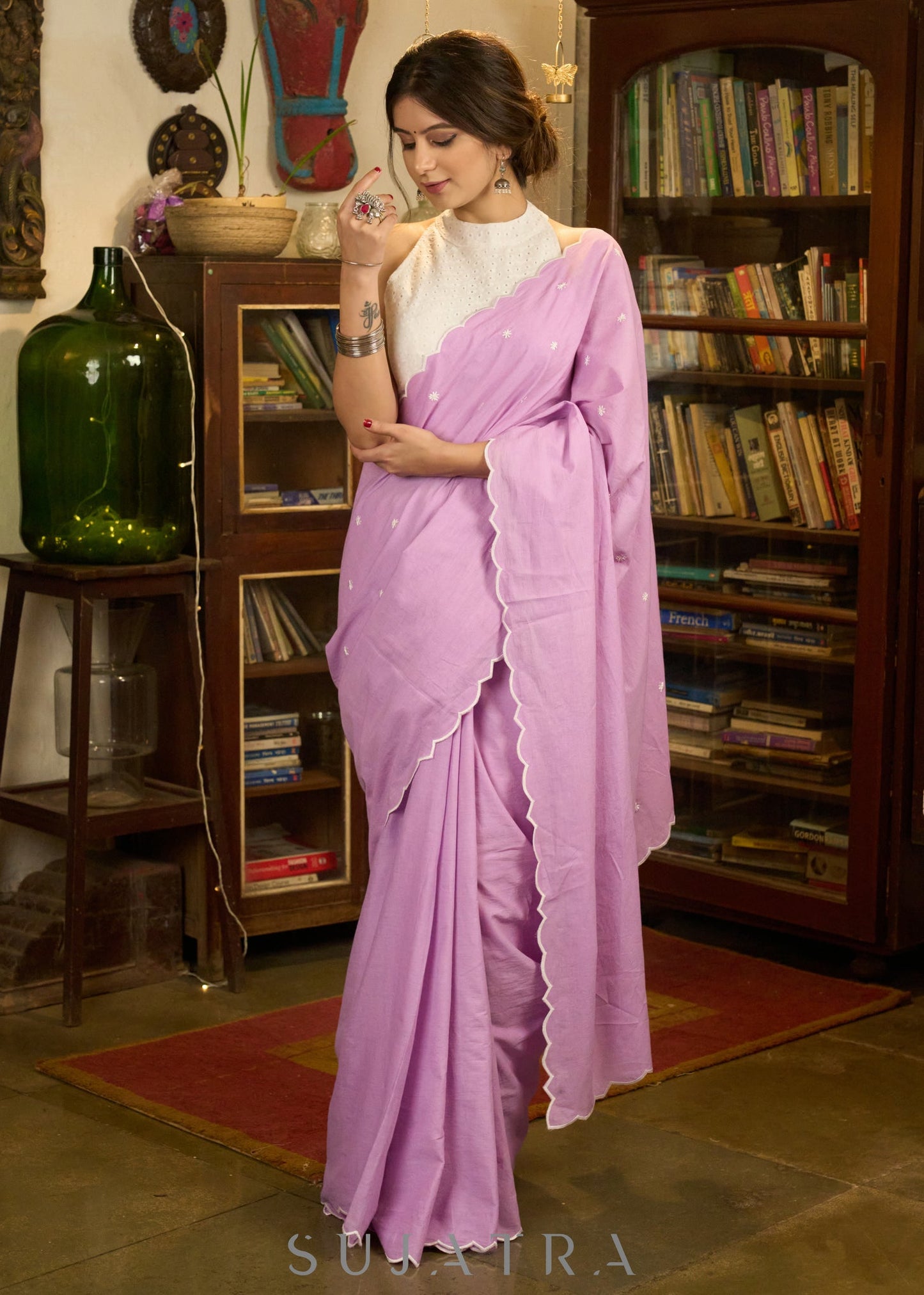 Gracious lilac mul cotton saree with embroidered disty florals and overall scallops