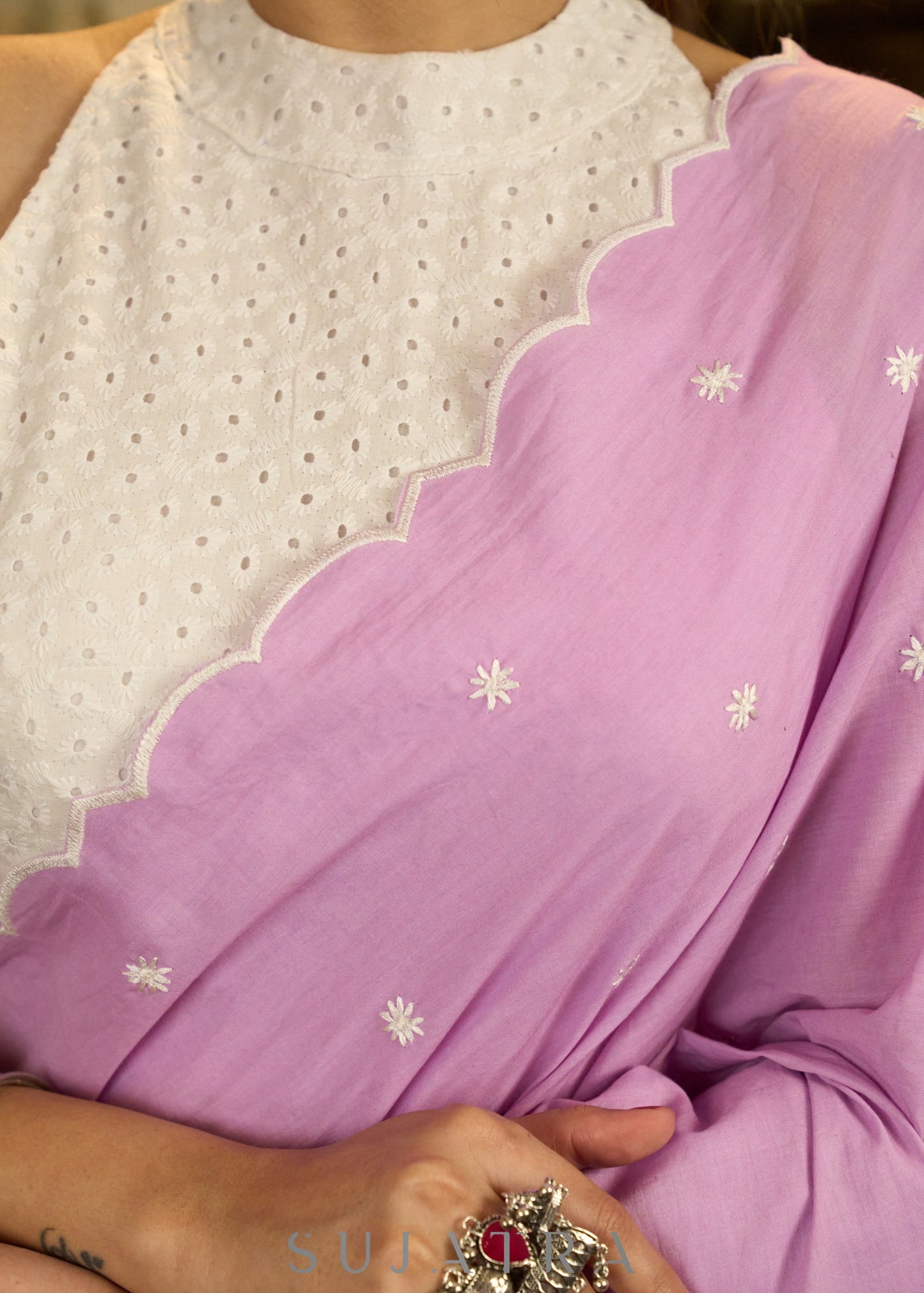 Gracious lilac mul cotton saree with embroidered disty florals and overall scallops