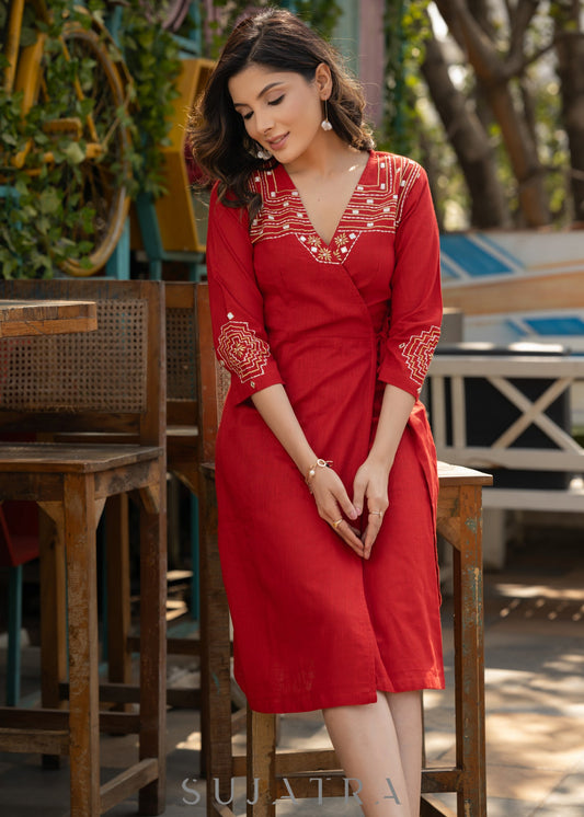 Beautiful red cotton overlap dress highlighted with intricate embroidery