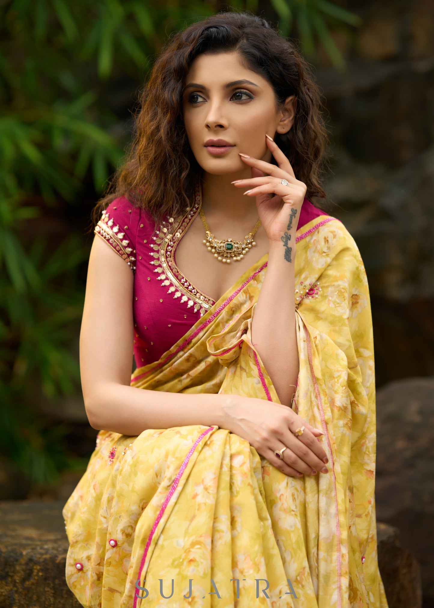 Graceful yellow floral print saree highlighted with overall beautiful hand embroidered mirrors