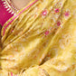 Graceful yellow floral print saree highlighted with overall beautiful hand embroidered mirrors