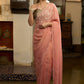 Luscious peach organza saree with beautiful floral hand embroidey and overall scallops