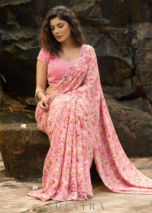 Beautiful blush pink floral saree highlighted with overall pearl embroidery