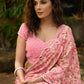 Beautiful blush pink floral saree highlighted with overall pearl embroidery