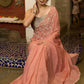 Luscious peach organza saree with beautiful floral hand embroidey and overall scallops