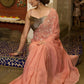 Luscious peach organza saree with beautiful floral hand embroidey and overall scallops