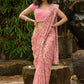 Beautiful blush pink floral saree highlighted with overall pearl embroidery