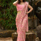 Beautiful blush pink floral saree highlighted with overall pearl embroidery