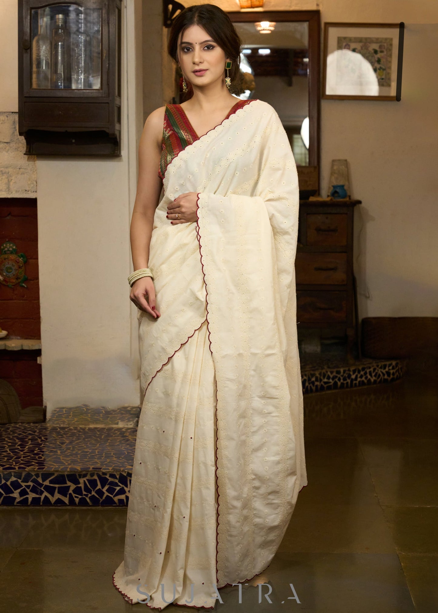 Breezy hakoba cotton saree highlighted with embroidered dots and overall scallops