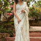 Stylish ice blue floral printed saree highlighted with beautiful golden embroidery